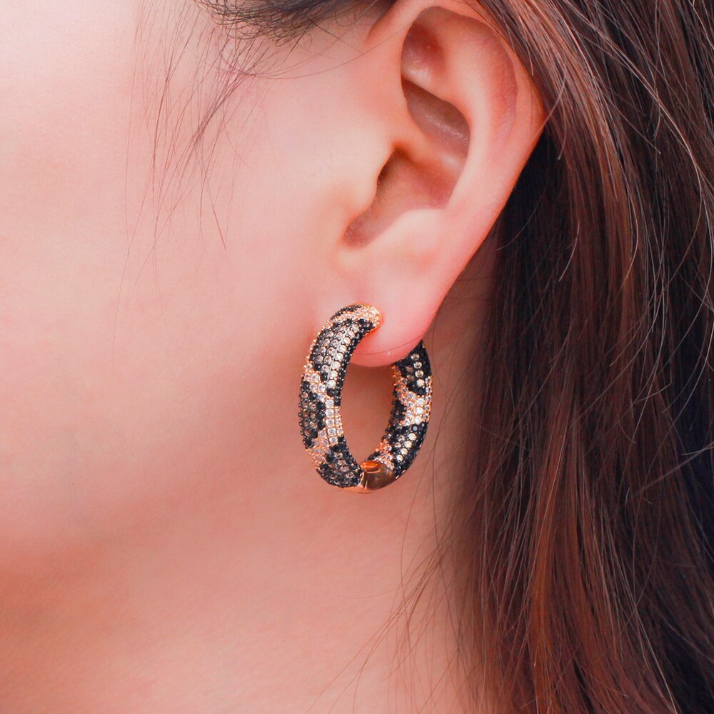 Snake Print Hoop Earrings on model