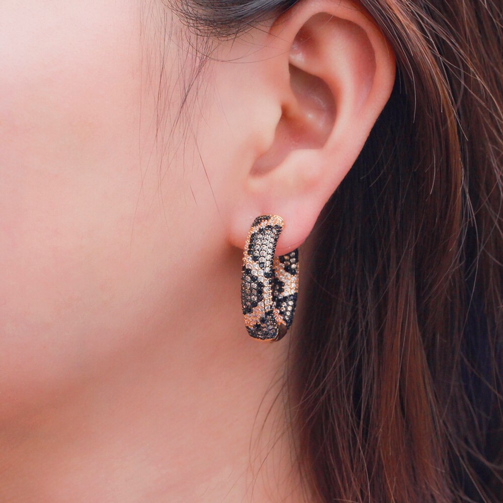 Snake Print Hoop Earrings on model
